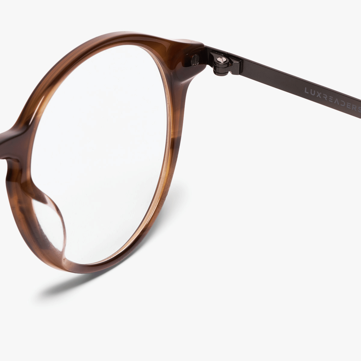 Luxreaders stylish Women's Ærø Pale Brown Reading glasses. Made from Titanium in a Round shape.