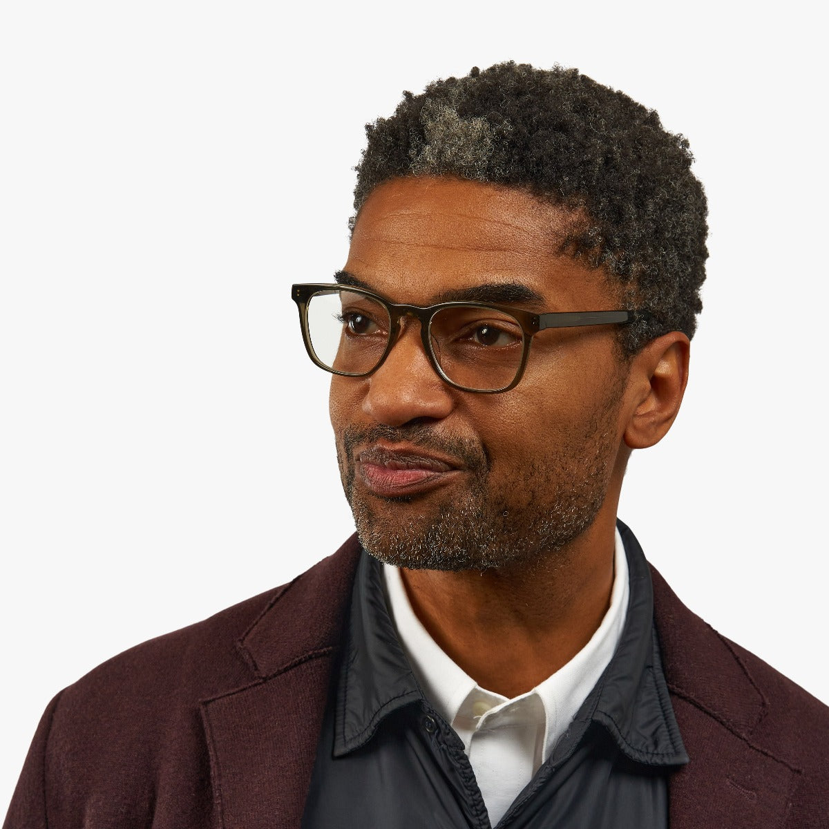 Person wearing Bornholm Shiny Olive rectangular glasses