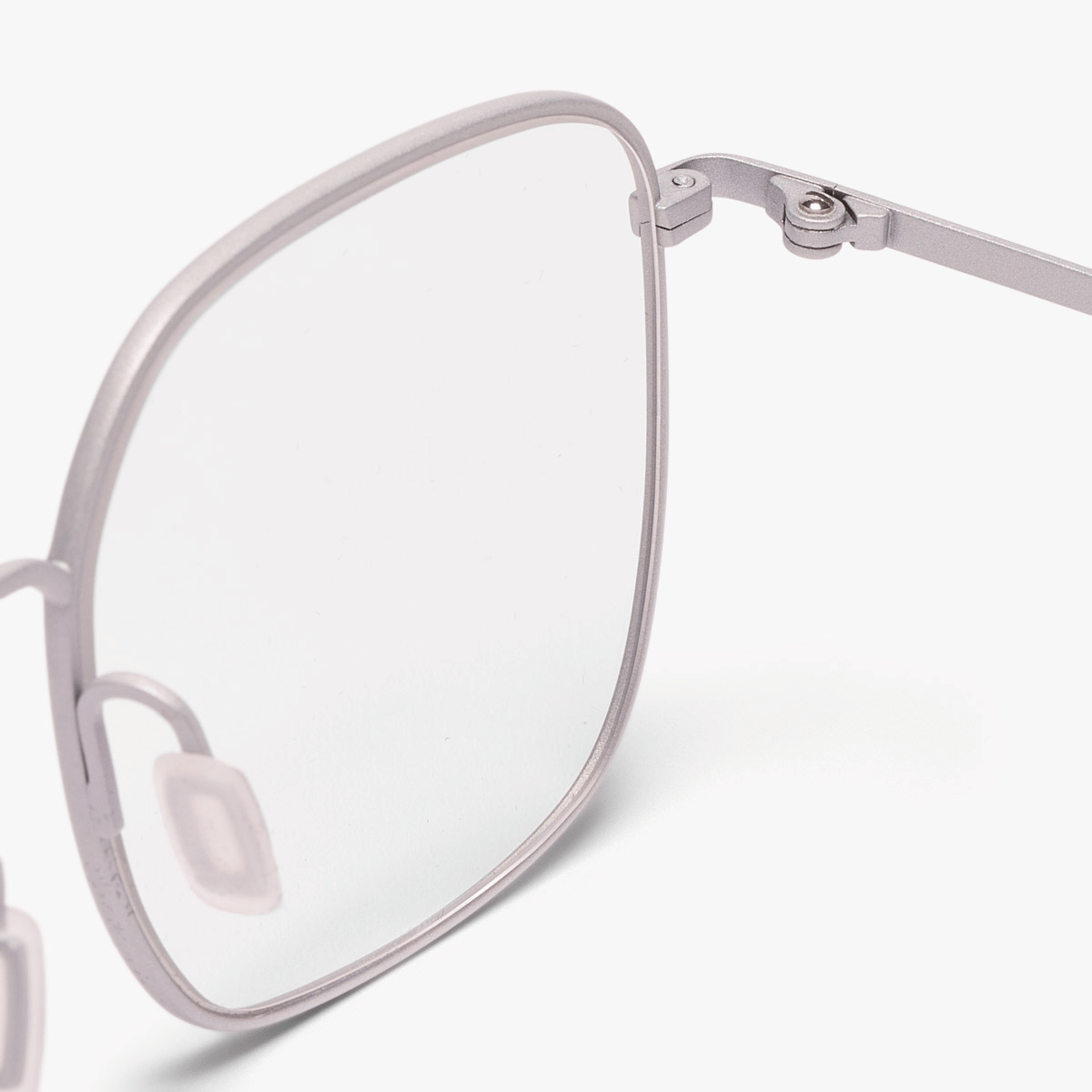 Close-up of Men's Båstad Steel eyewear frame with a sleek metallic finish