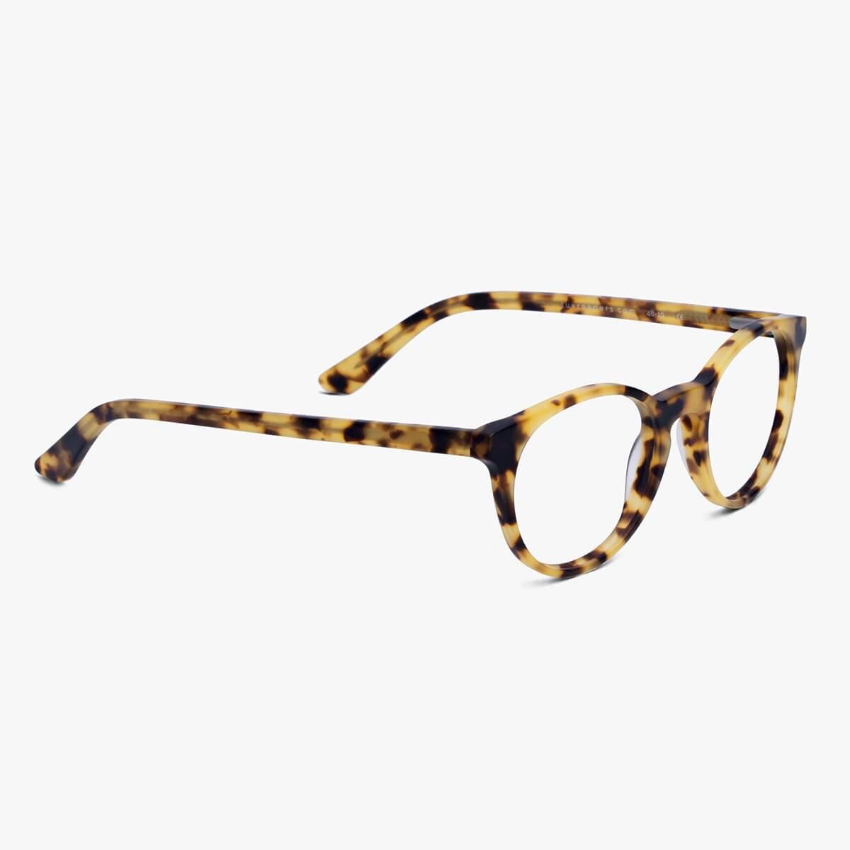 Tortoiseshell reading glasses with round frames and sleek design
