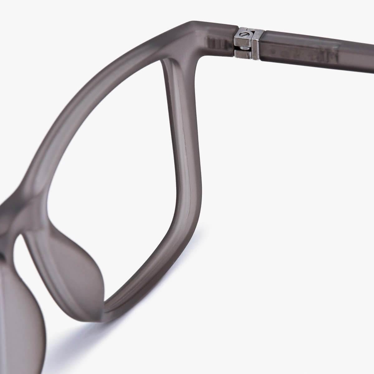Close-up of grey Skagen men’s eyeglasses with a sleek modern frame