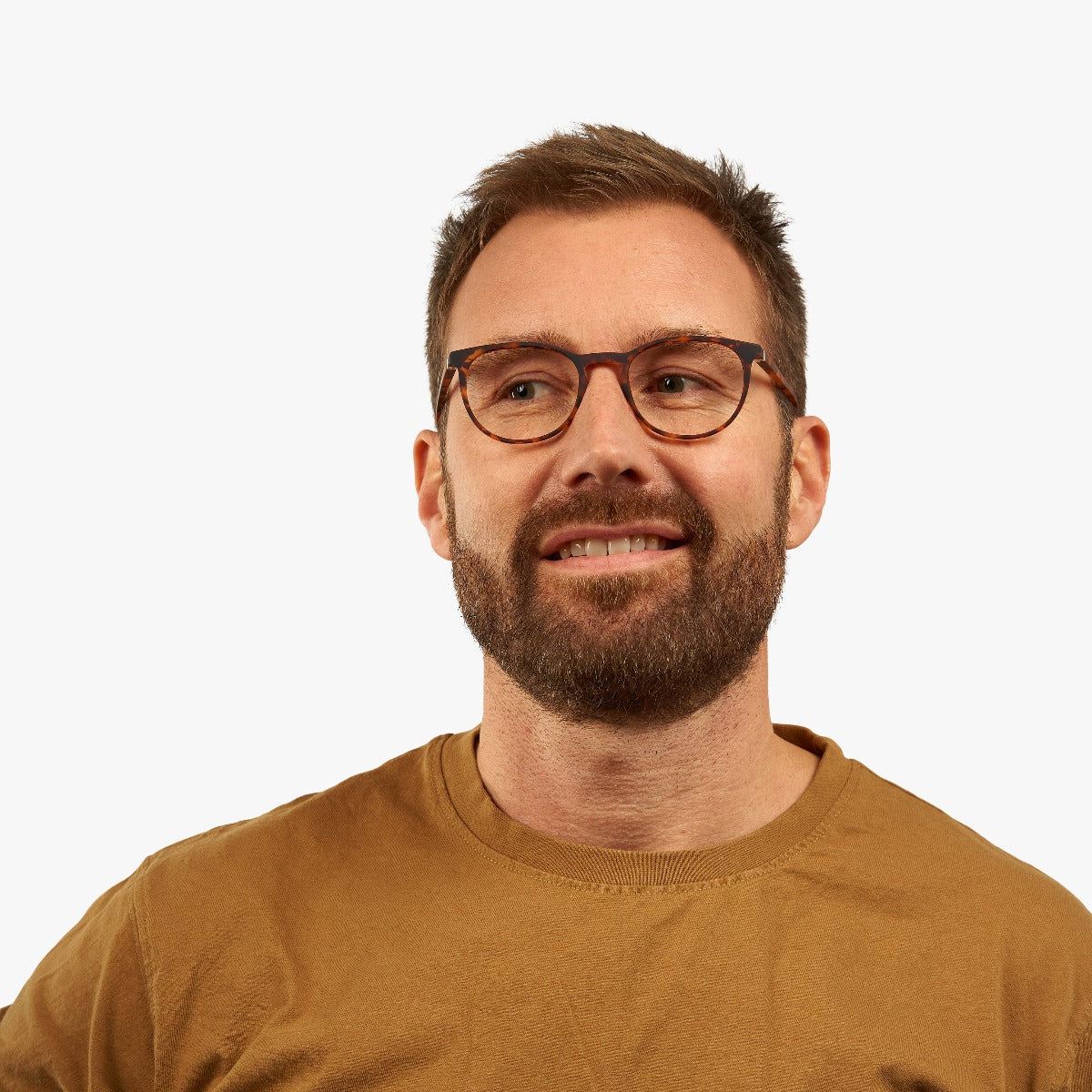 Person wearing Men's Stockholm Turtle reading glasses