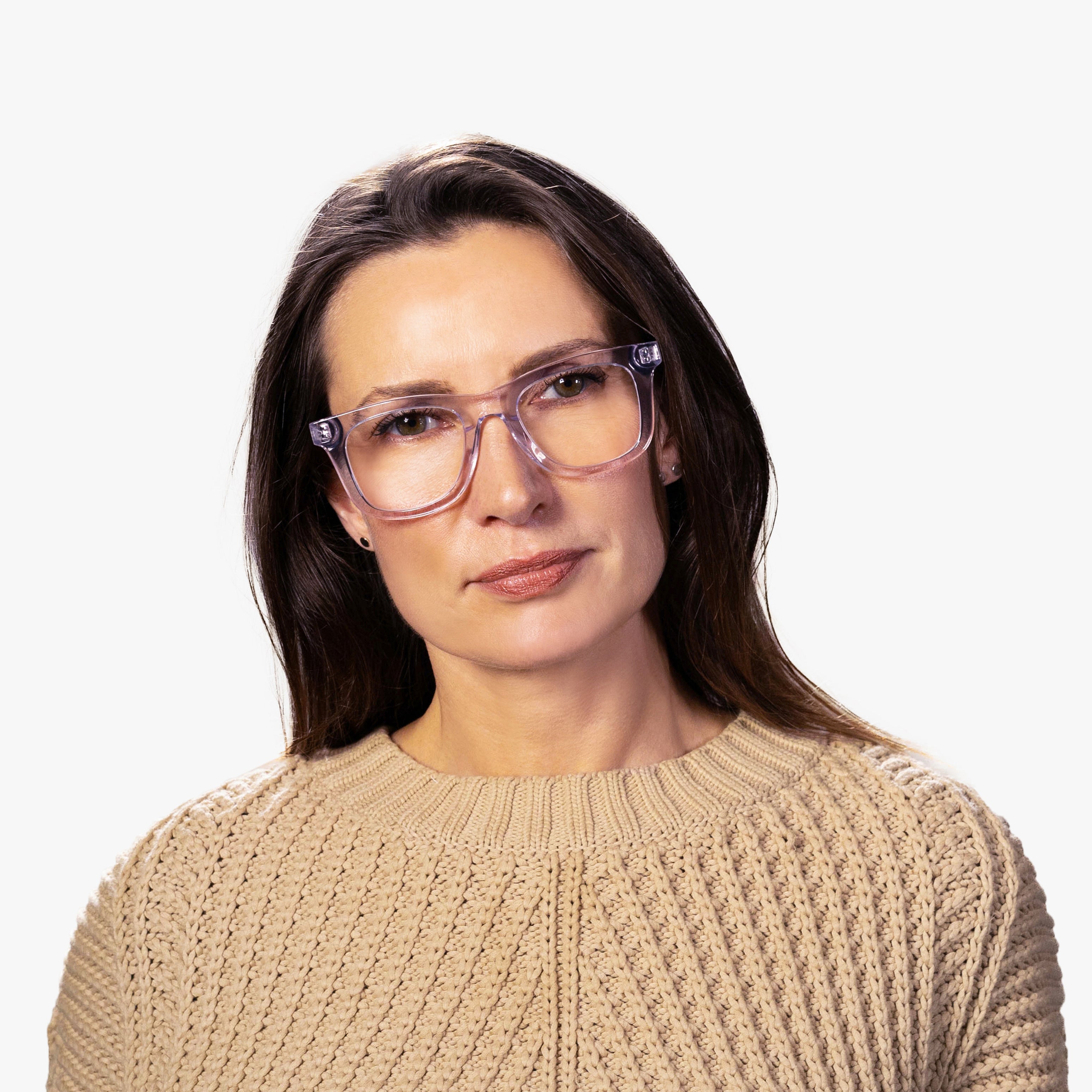 Person wearing Samsø Crystal White reading glasses
