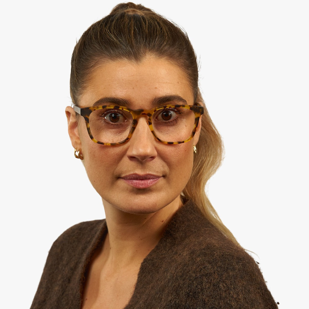 Person wearing tortoiseshell Bornholm Light Turtle glasses