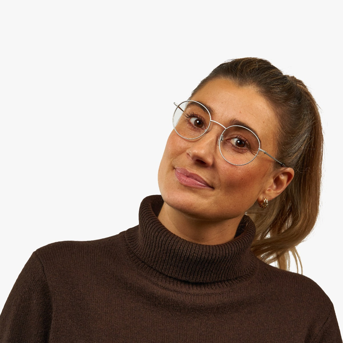 Person wearing Women's Tromsø Steel glasses with silver frames